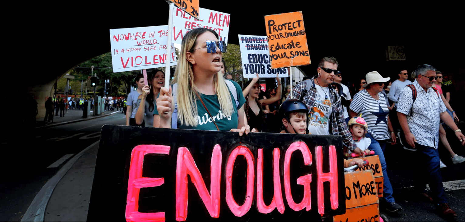 Protestors marching against violence towards women in Sydney, as thousands rallied across the country. Image: Lisa Maree Williams/Getty Images